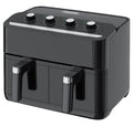 Black air fryer with control knobs on a light gray background