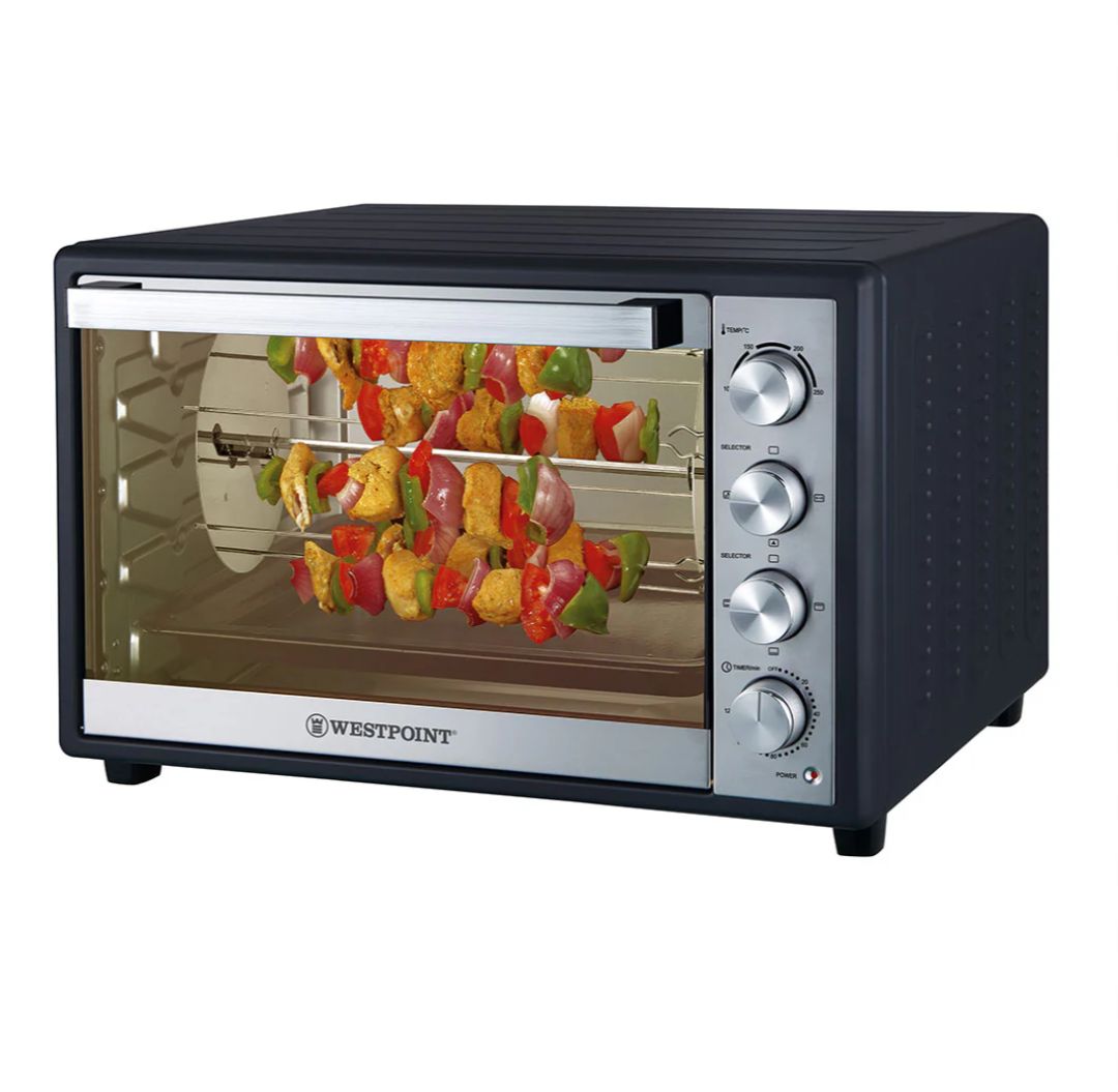 Westpoint toaster oven with visible interior showing skewered vegetables on a white background
